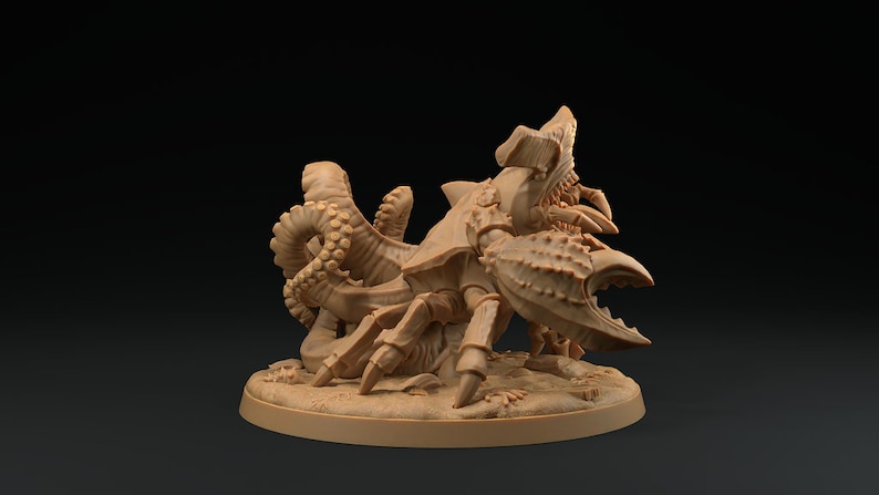 May include: A brown, detailed miniature of a crab-like creature with tentacles. The creature has a large, spiky claw and a segmented body. It is standing on a round base.