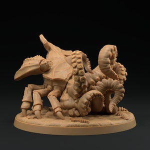 May include: A brown, detailed miniature of a crab-like creature with tentacles, resembling a mythical beast. The miniature is posed on a circular base.