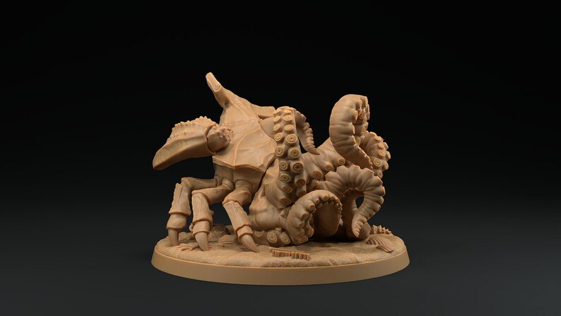May include: A brown, detailed miniature of a crab-like creature with tentacles, resembling a mythical beast. The miniature is posed on a circular base.