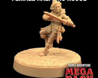 May include: A tan-colored miniature figurine of a halfling rogue standing on a 25x25mm textured base. The character holds a sword horizontally, wears a hooded tunic, and has a dagger at the hip. Text reads: FEMALE HALFLING ROGUE TRIPLE ADVENTURE MEGA PACK.