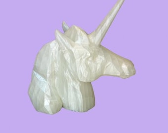 Unicornio impreso en 3D que brilla en la oscuridad
