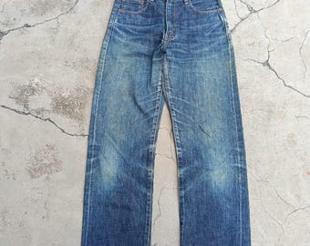 Vintage Distressed Levi's 502 Big E selvedge made in Japan size 29.
