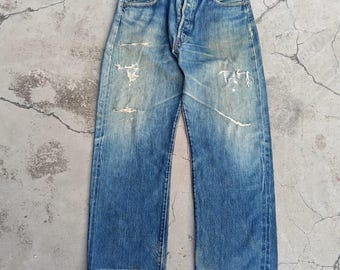 Vintage sliten Levi's 501XX BIG E Redline selvedge tillverkad i USA. Storlek 32