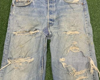 Vintage Levi's made in USA Thrashed Cut Off Denim Shorts. Size 34
