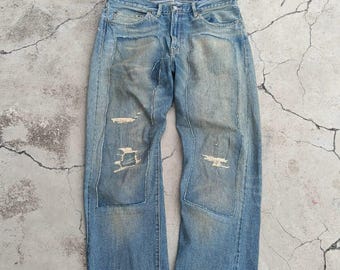 Jeans vintage Levi's 501Z XX BIG E selvedge con effetto usurato e patchwork, taglia 36.