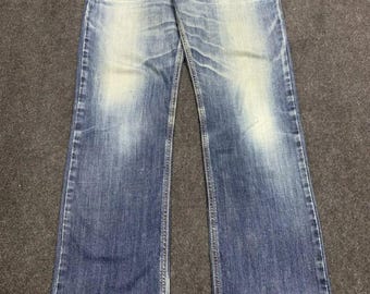 Vintage Edwin Blue Trip Jeans Made in Japan BTD006, Distressed Blue Wash Denim.