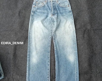 Jeans vintage anni '90 Levi's 503B Big E in denim selvedge con lavaggio slavato.