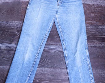Vaqueros Calvin Klein azules de los años 80, de mezclilla vintage de tiro alto de los años 80.