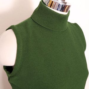 May include: A set of three ceramic mugs with a speckled, matte finish. The mugs are in shades of cream, light grey, and dark grey. Each mug has a simple, minimalist design, ideal for coffee or tea.