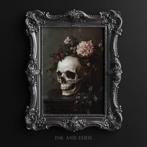 May include: A framed painting of a human skull with flowers and a butterfly. The skull is white and the flowers are pink and white. The butterfly is orange and black. The frame is ornate and silver.
