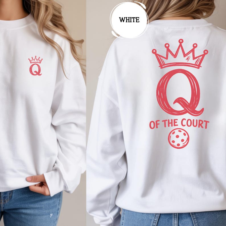 May include: White sweatshirt with a red crown and the letter "Q" on the front. The back of the sweatshirt features a larger crown, the letter "Q", the words "OF THE COURT", and a pickleball graphic.
