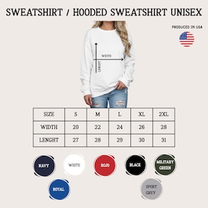 May include: White unisex sweatshirt with size chart. Width measurements range from 20 to 28 inches, and length measurements range from 27 to 31 inches. Available colors include navy, white, red, black, military green, royal, and sport grey. Produced in USA.