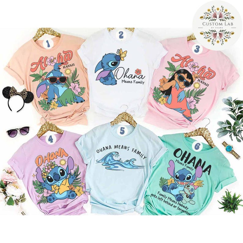 May include: Collection of six colorful t-shirts featuring the character Stitch from Lilo & Stitch. Designs include Stitch with sunglasses, floral accents, and the phrases "Aloha Hawaii" and "Ohana Means Family".