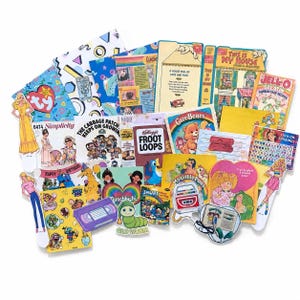 May include: A collection of vintage-style paper ephemera featuring colorful illustrations of 1980s and 1990s pop culture icons, including Care Bears, My Little Pony, Glo Worm, Froot Loops, and Barbie paper dolls on a white background.