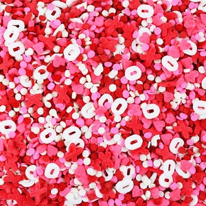 XOXO Sprinkle Blend - a fun blend of pink, red, and white heart and dot sprinkles for decorating Valentines day cakes, cookies, and treats!
