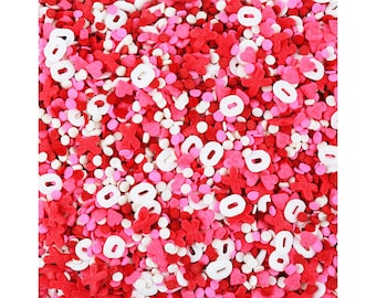 XOXO Sprinkle Blend - a fun blend of pink, red, and white heart and dot sprinkles for decorating Valentines day cakes, cookies, and treats!