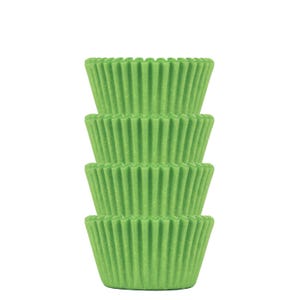 May include: A stack of four green cupcake liners. The liners are made of paper and have a fluted design.