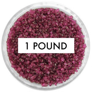 May include: A clear container filled with 1 pound of pink sparkling sugar crystals.