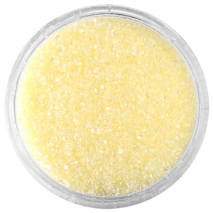 May include: A clear plastic container filled with pale yellow, granular sugar crystals. The sugar has a slightly iridescent quality, reflecting light. The container is round and sits against a white background.