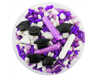 May include: Purple, white, and black graduation sprinkles in a clear container. The sprinkles are shaped like graduation caps, stars, and small cylinders.