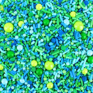 Seas The Day Sprinkle Blend 4 OZ - A mix of jimmies, non-pareils, sugar pearls, dots, candy beads, and sixlets in shades of green and blue.