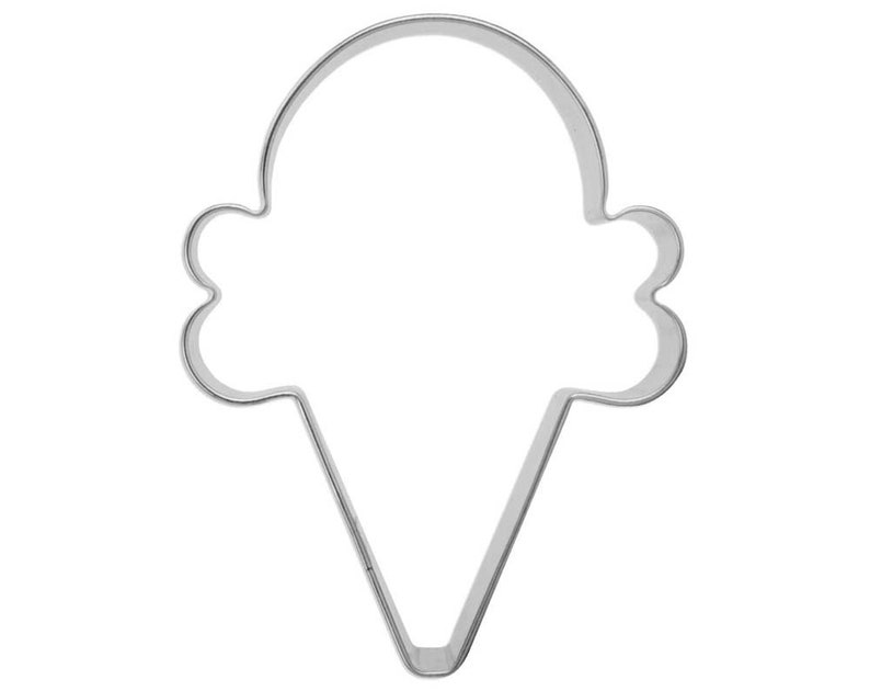 May include: A silver metal ice cream cone cookie cutter.