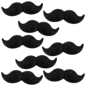 May include: Seven black felt self-adhesive fake mustaches. The mustaches are shaped like a traditional handlebar mustache.