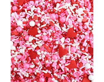 Valentine Sprinkle Blend - a fun blend of pink, red, and white heart sprinkles for decorating Valentines day cakes, cookies, and treats!