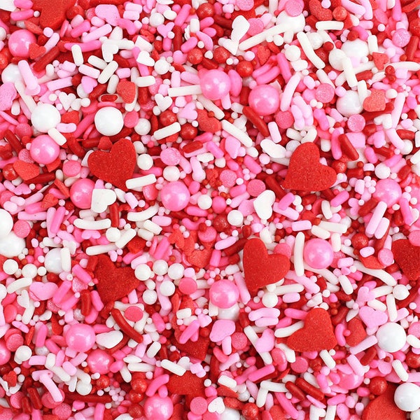 Valentine Sprinkle Blend - a fun blend of pink, red, and white heart sprinkles for decorating Valentines day cakes, cookies, and treats!