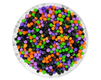 Monster Mash Nonpareils Blend - Our monster mash blend is a mix of nonpareils in black, orange, purple, lavender, & lime green.