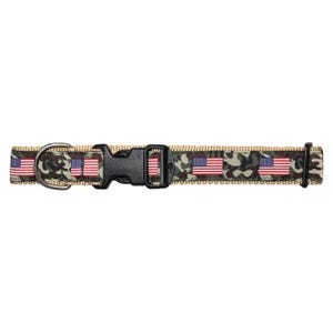 May include: A dog collar with a camouflage pattern and American flag accents. The collar features a black plastic buckle and a metal D-ring for leash attachment. The overall design is patriotic and suitable for pets.
