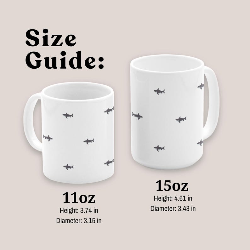 May include: Two white ceramic mugs with a shark pattern are displayed against a neutral background. The text "Size Guide:" is at the top. The 11oz mug is 3.74 inches high and 3.15 inches in diameter. The 15oz mug is 4.61 inches high and 3.43 inches in diameter.