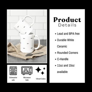 May include: Two white ceramic mugs with a C-handle, each adorned with a pattern of small, dark gray shark illustrations. The mugs are displayed on a tan linen napkin with a spoon. The text "Product Details" is visible.