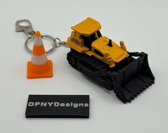 Bouwvakker cadeau grondbreker (geel/zwart) sleutelhanger | Gegoten bulldozer, graafmachine, kiepwagen + kegellabel |