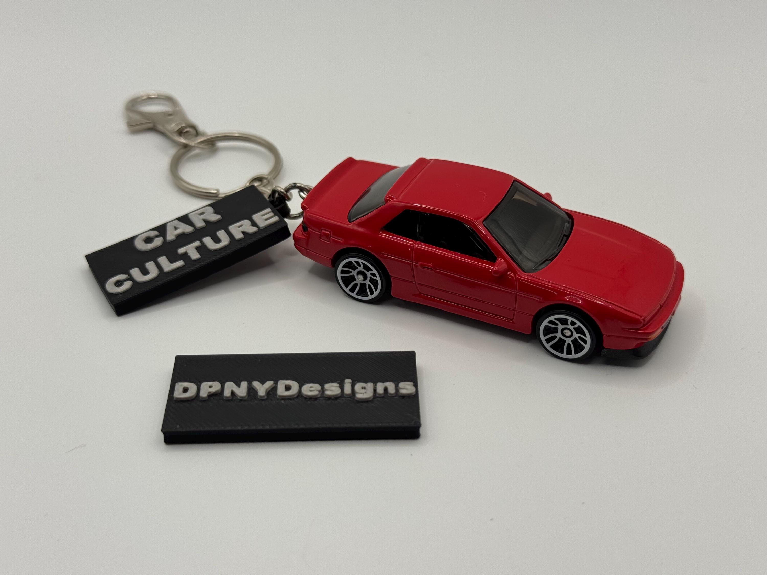 15th Anniversary Doll 熊怠怠 豪華ダイヤカスタム Custom Nissan Silvia (S13) (red) Diecast Keychain | Car Culture