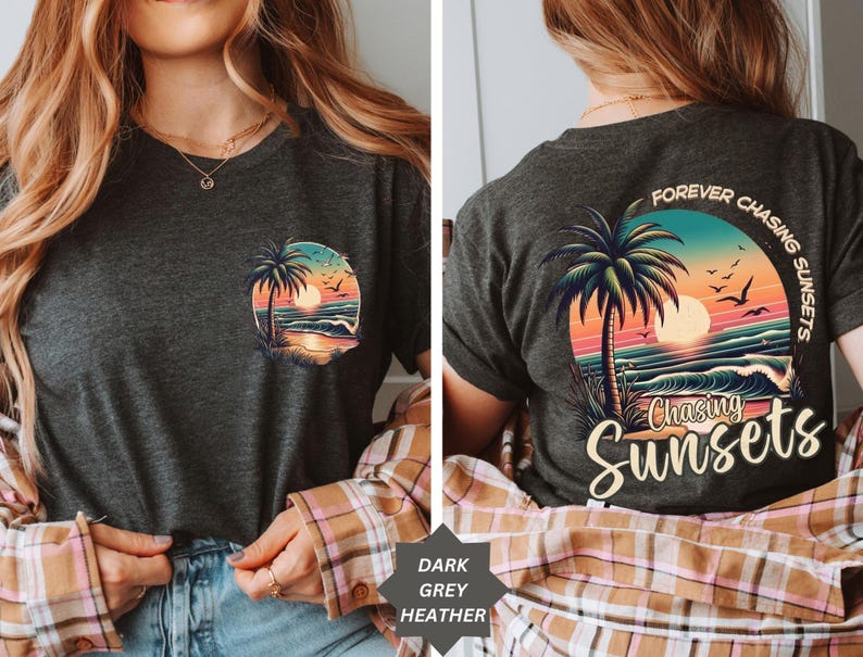 May include: Dark grey heather t-shirt featuring a colorful sunset and palm tree graphic. The front of the shirt has a small circular design, while the back displays a larger design with the words "Forever Chasing Sunsets."