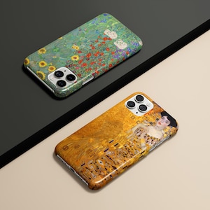 May include: Two phone cases with artistic designs. One case features a floral pattern with sunflowers and red flowers on a green background. The other case displays a portrait with gold and yellow tones.