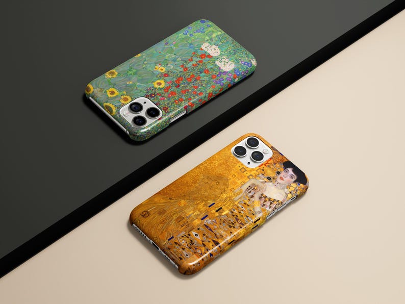 May include: Two phone cases with artistic designs. One case features a floral pattern with sunflowers and red flowers on a green background. The other case displays a portrait with gold and yellow tones.