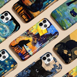 May include: A collection of phone cases featuring artistic cat designs. The cases showcase various styles, including a starry night, a cat in a pond, and floral patterns. Each case has a glossy finish and a camera cutout.