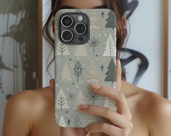 May include: A phone case with a festive Christmas tree pattern. The case features various stylized trees in white, beige, and dark gray on a light gray background. Snowflakes and starbursts are scattered throughout the design, creating a winter holiday theme.