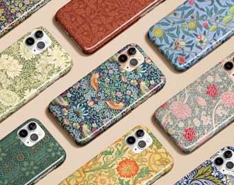 May include: A collection of phone cases with floral and botanical patterns. The cases feature various designs, including birds, flowers, and leaves, in a range of colors such as blue, green, red, and yellow. The cases are arranged on a neutral background.