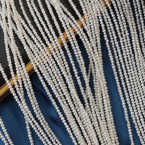Seedless smooth 2.5-3 mm small potatoes, natural freshwater pearls, small punches, a string of about 38cm150 pieces long