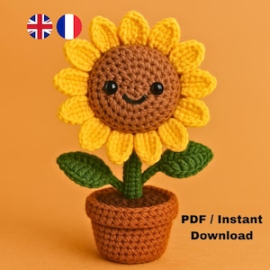 Peut inclure: Un tournesol au crochet dans un pot marron. Le tournesol a des pétales jaunes, un centre marron avec un visage souriant, des feuilles vertes et une tige verte. Le pot est également marron. Le texte sur l'image indique "PDF / Téléchargement instantané."