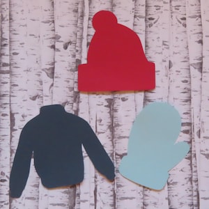 May include: Three paper cutouts of winter clothing items: a red beanie, a blue sweater, and a light blue mitten.