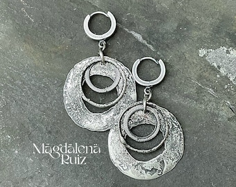 Cast, sterling silver earrings. Textured links, brutalist, raw look.