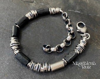 Mens bracelet with black unpolished tourmaline tubes and raw silver components.