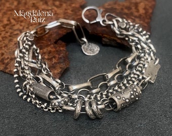 Chunky, heavy solid sterling bracelet, multi chain, layered with cast components.