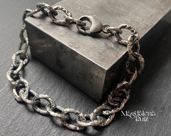 Oval, textured link bracelet. Sterling silver cast from wax.