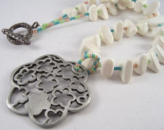 Pastel Bloom.. Silver flower pendant, white wood nuggets & pastel seed bead necklace