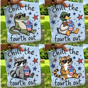 May include: Light blue tote bags with the text "chill the fourth out." Each bag features a different animal wearing sunglasses and holding a red, white, and blue drink: an alligator, a duck, a raccoon, and a tiger. Red and blue stars decorate the bags.